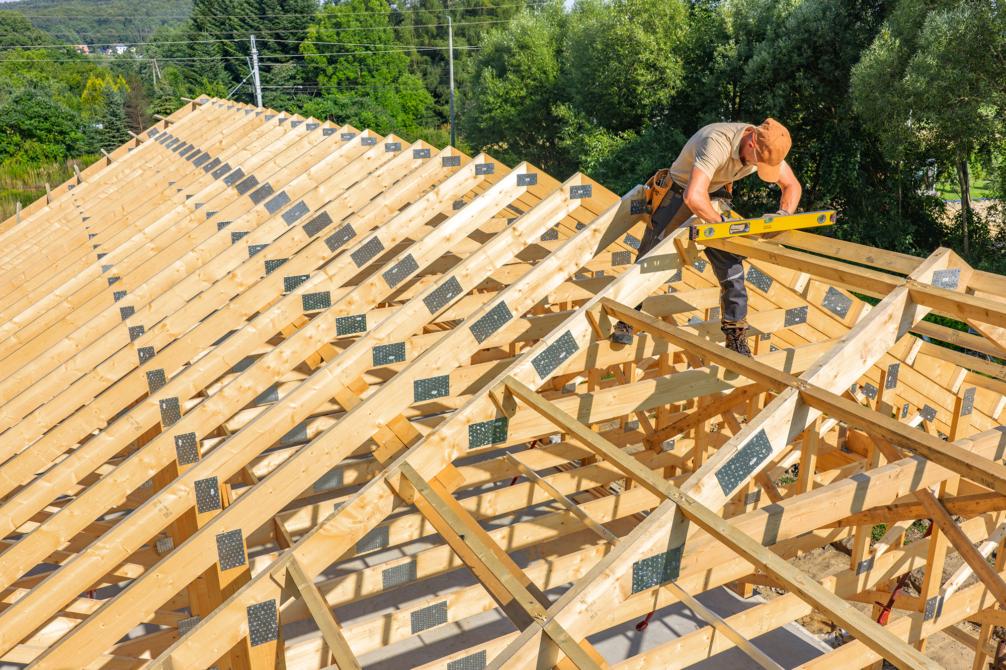Roofer building new trusts for roof Roofer building new trusts for roof